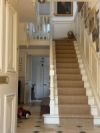 brown sisal stair carpet in English country home